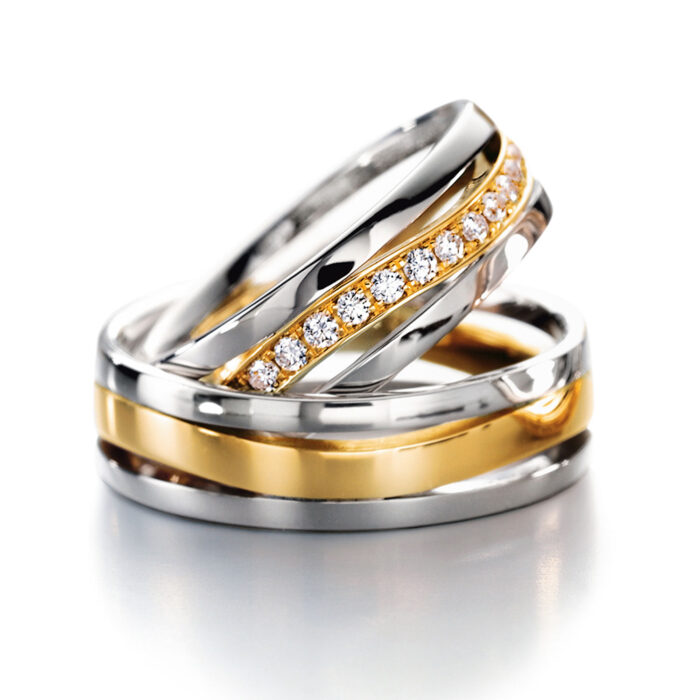Furrer Jacot ring pair 750 white/yellow gold | 18 brilliant-cut diamonds