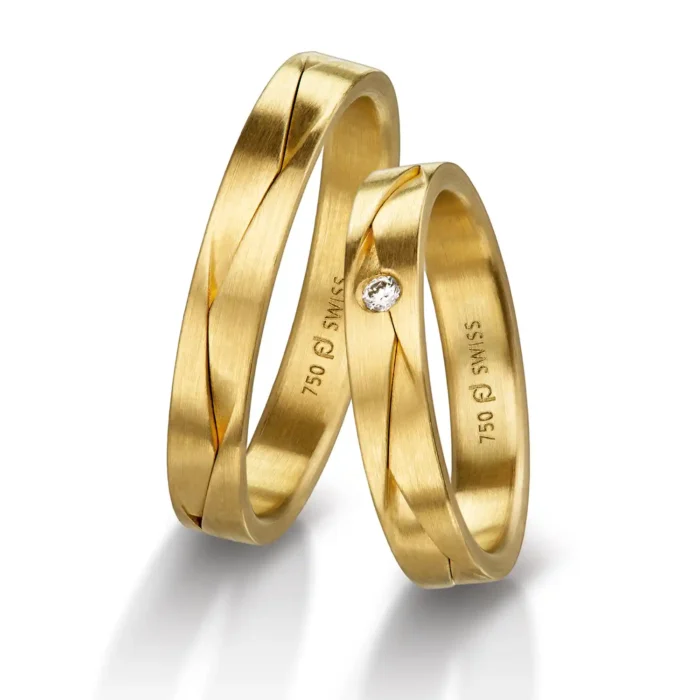 Furrer Jacot Ringpaar 750 Gelbgold | 1 Brillant 0.030 ct